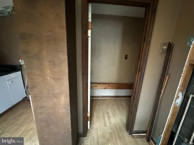 a bathroom with a glass door shower