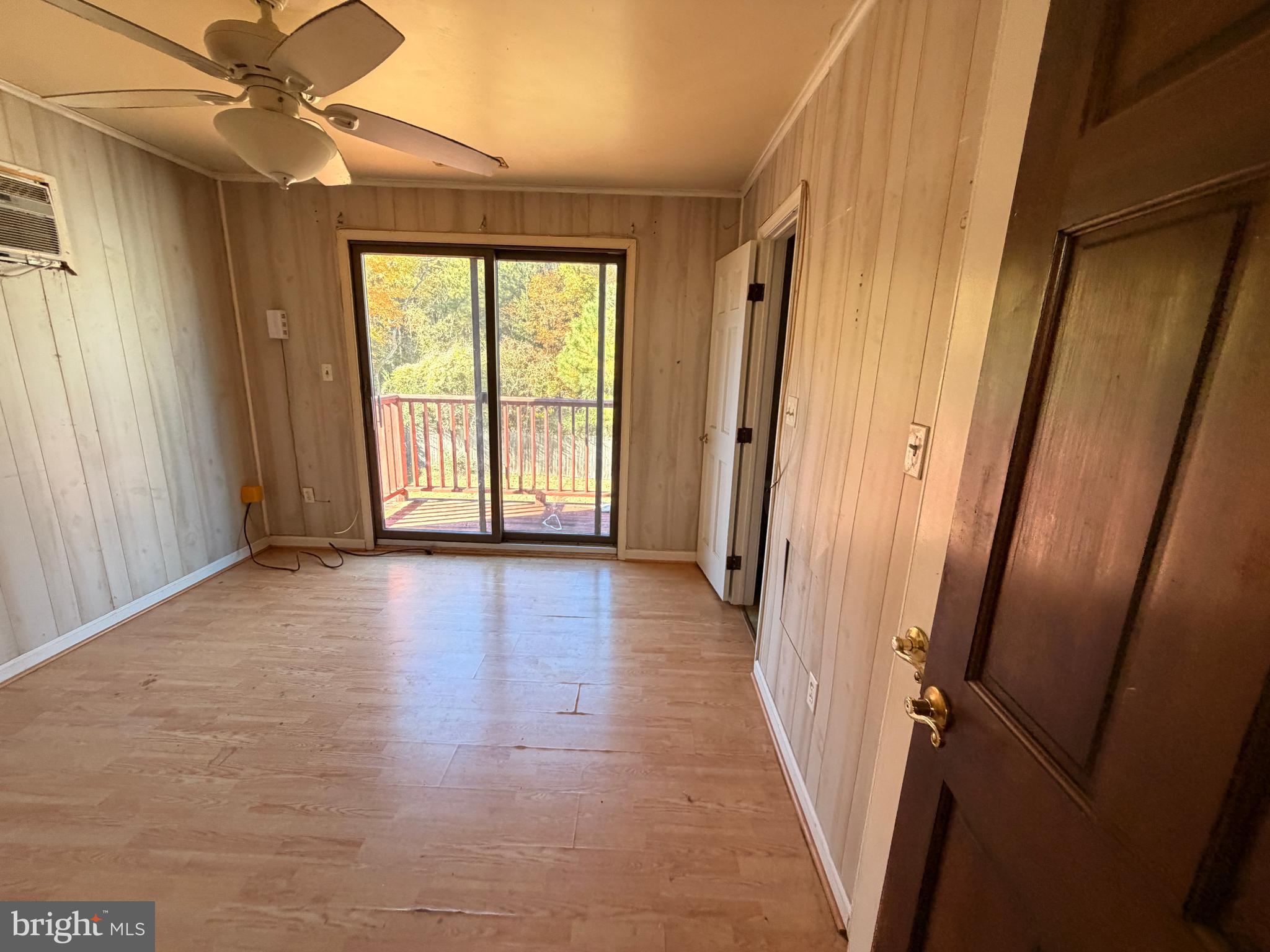 23540 Deal Island Road Chance, MD 21821 - Photo 35 of 41 wooden floor in an empty room with a window