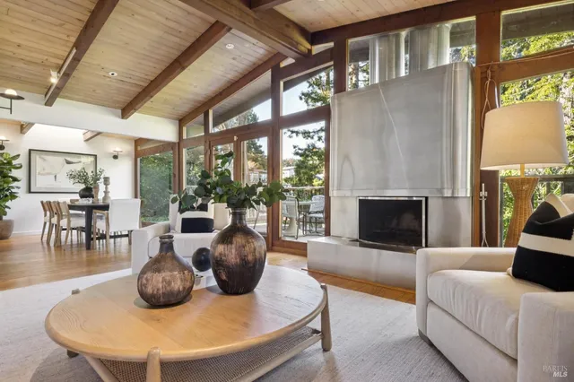 a bedroom with furniture and a fireplace