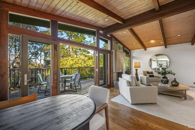 a view of a balcony with furniture