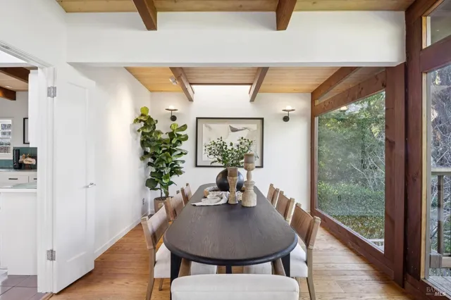 a view of a patio with a table and chairs