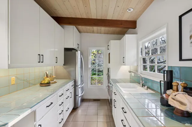 a bathroom with a sink and mirror