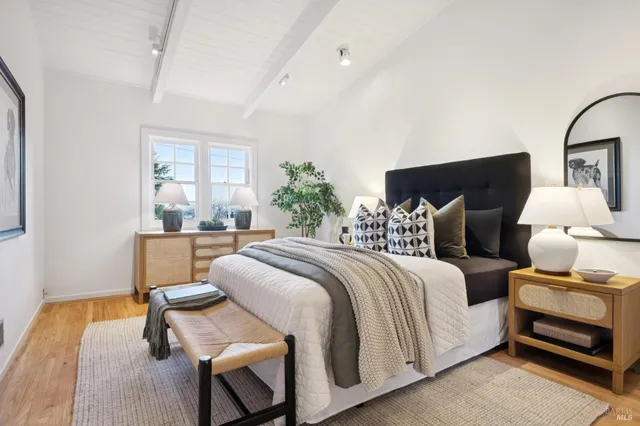 a view of a walk in closet and bedroom view