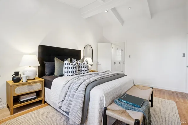 a view of a patio with table and chairs and potted plants