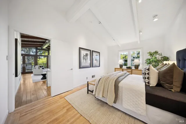 a view of balcony with two chairs and a table