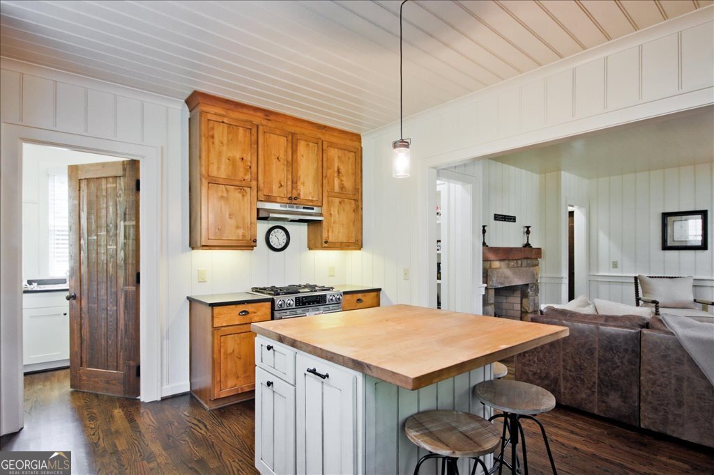 109 Coneflower Lane Toccoa, GA 30577 - Photo 13 of 49 a view of a kitchen area with furniture and wooden floor
