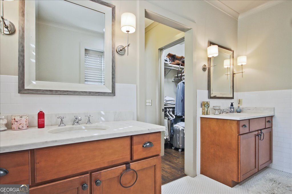 109 Coneflower Lane Toccoa, GA 30577 - Photo 19 of 49 a bathroom with a sink double vanity and a mirror