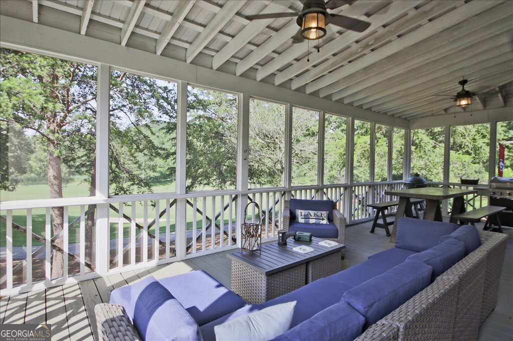 109 Coneflower Lane Toccoa, GA 30577 - Photo 33 of 49 a living room with furniture and a large window