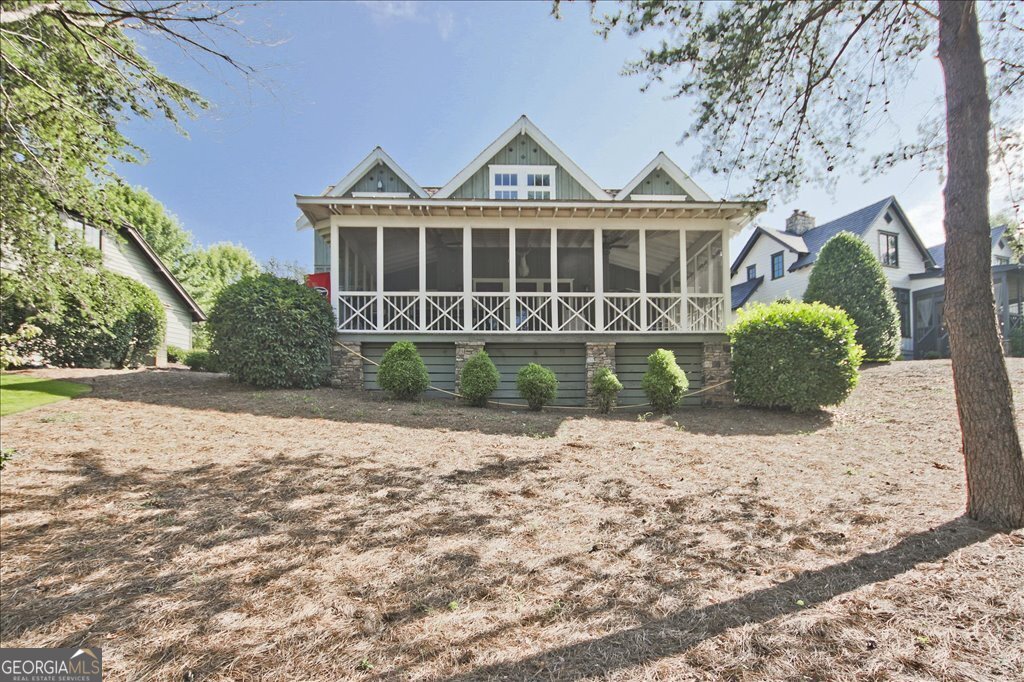 109 Coneflower Lane Toccoa, GA 30577 - Photo 35 of 49 a front view of a house with a yard and garage