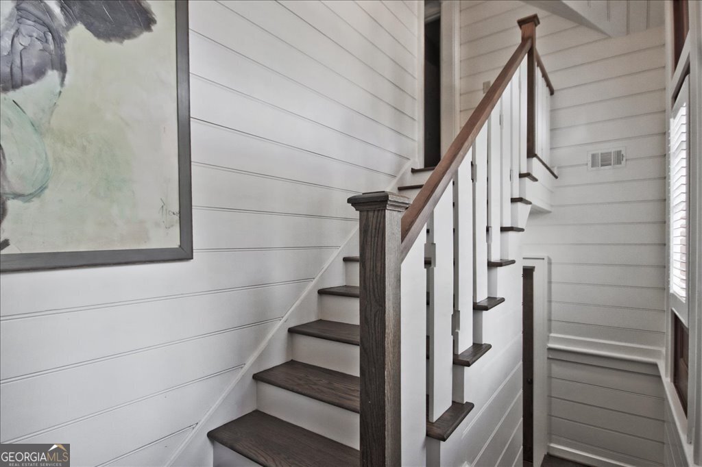 109 Coneflower Lane Toccoa, GA 30577 - Photo 5 of 49 a view of staircase with white walls and white door