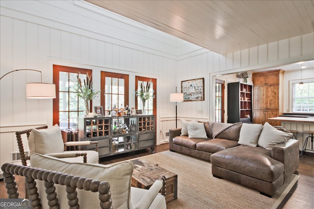 109 Coneflower Lane Toccoa, GA 30577 - Photo 9 of 49 a living room with furniture and large windows