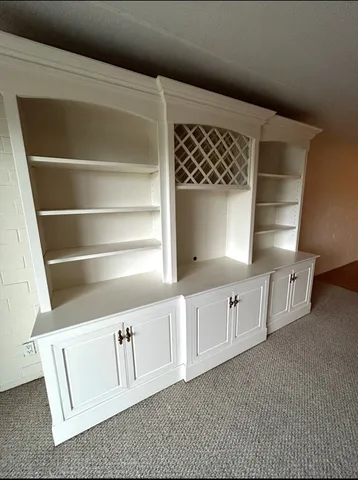 a view of cabinets and window