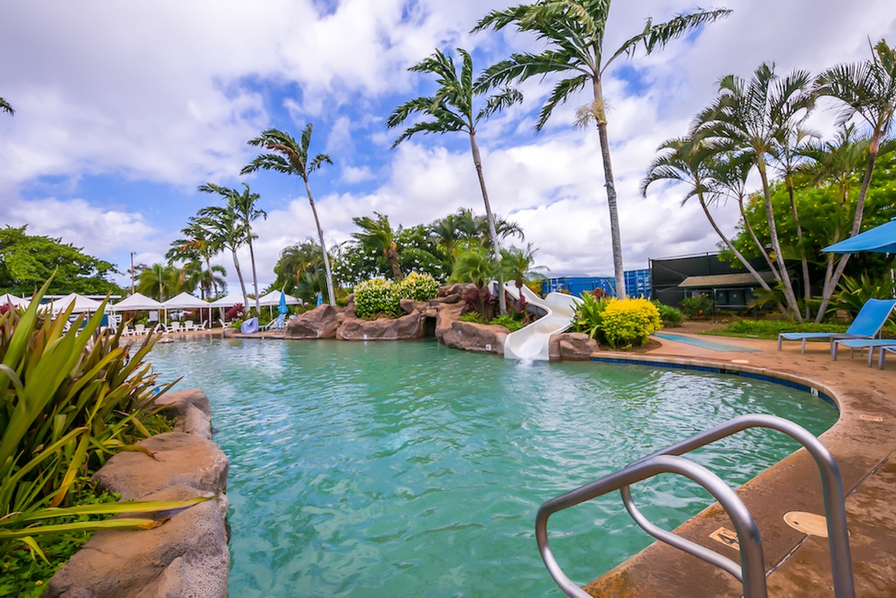 2253 Poipu Road, Unit 440 Koloa, HI 96756 - Photo 20 of 24 a view of swimming pool with a table and chairs
