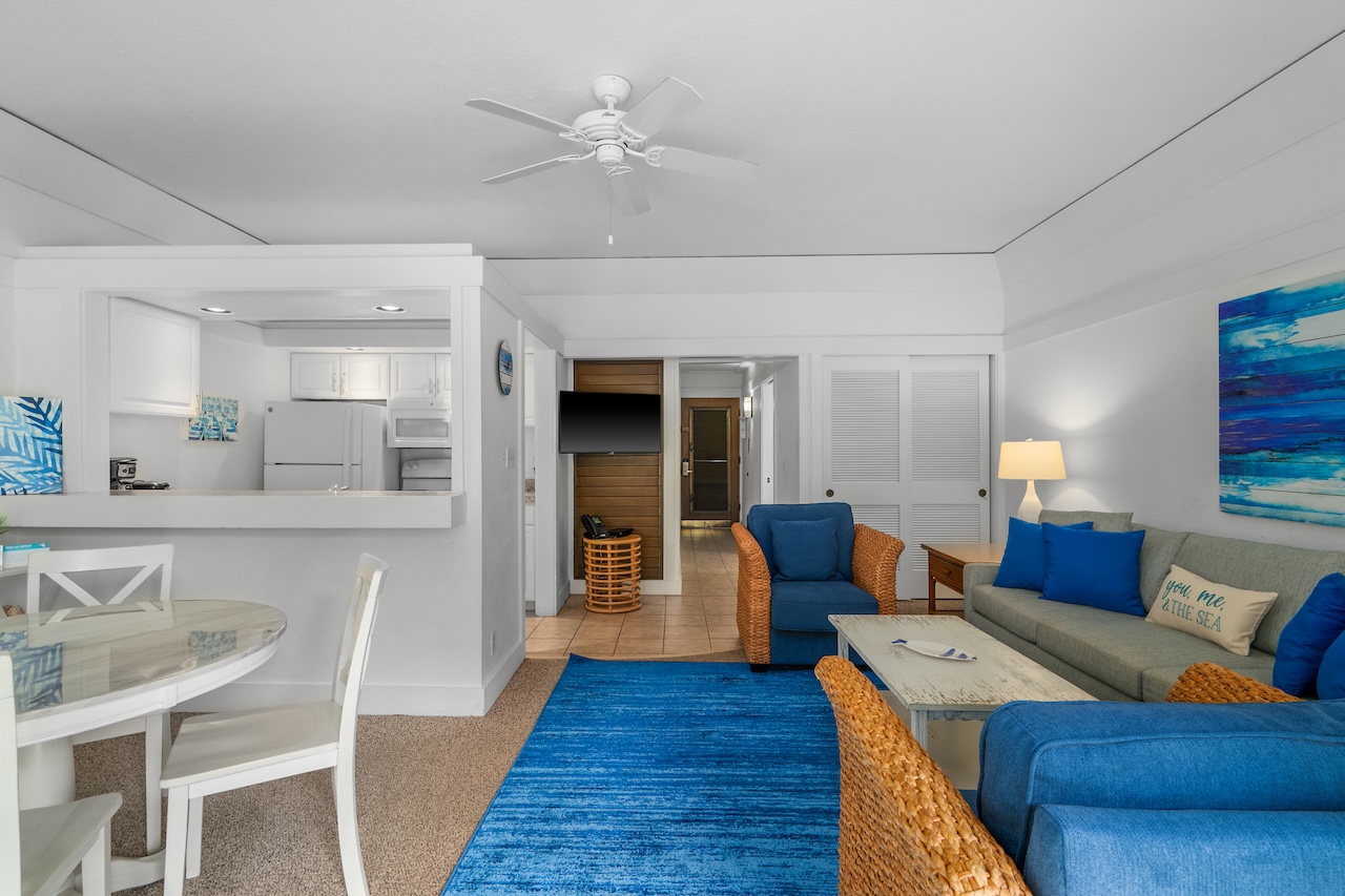 2253 Poipu Road, Unit 440 Koloa, HI 96756 - Photo 6 of 24 a view of a dining room with furniture window and wooden floor