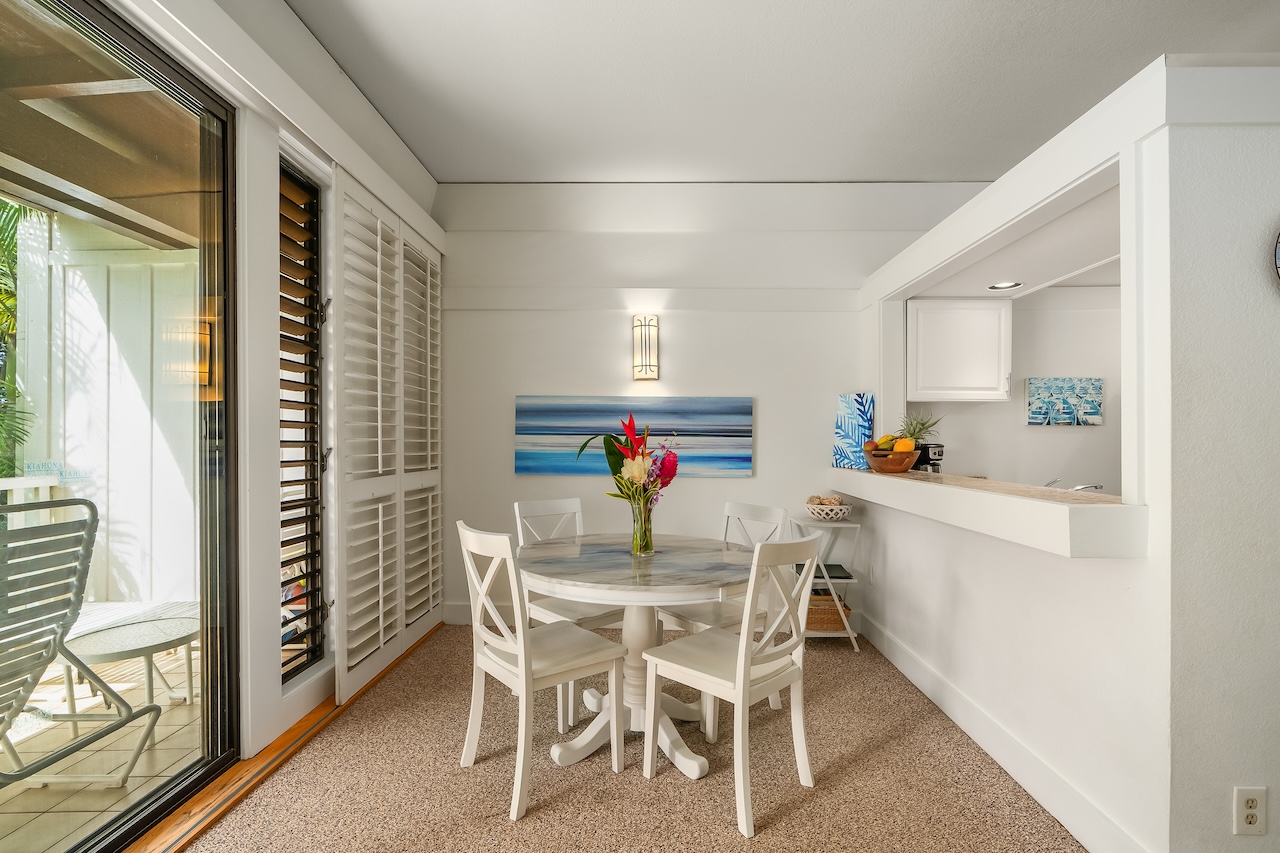 2253 Poipu Road, Unit 440 Koloa, HI 96756 - Photo 8 of 24 a view of a dining room with furniture window and outside view