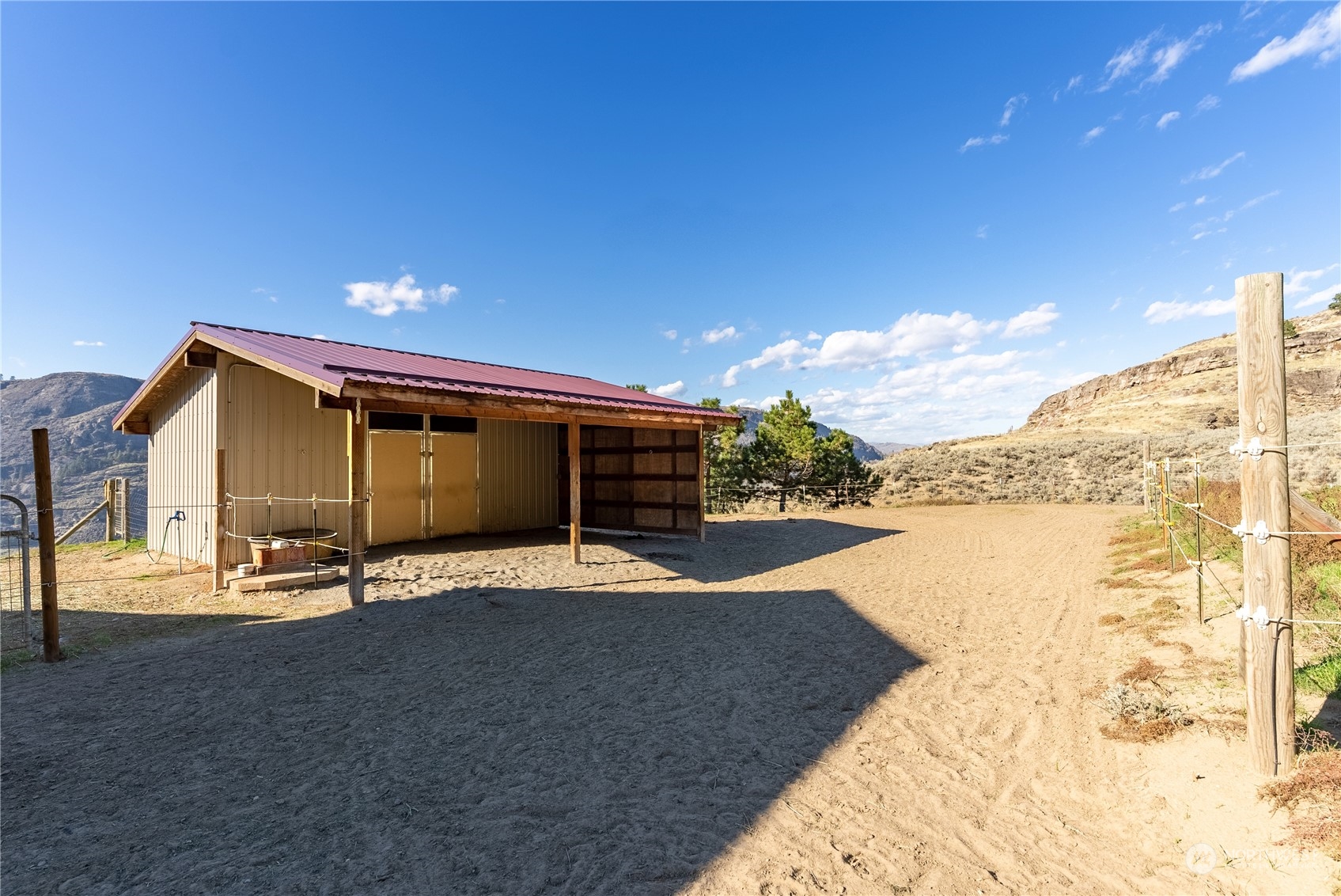 369 Tunk Creek Road Riverside, WA 98849 - Photo 11 of 40 a view of a house with a yard