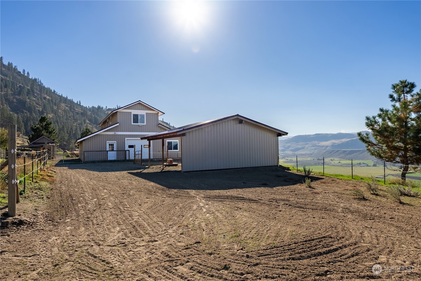 369 Tunk Creek Road Riverside, WA 98849 - Photo 12 of 40 a front view of a house with a yard