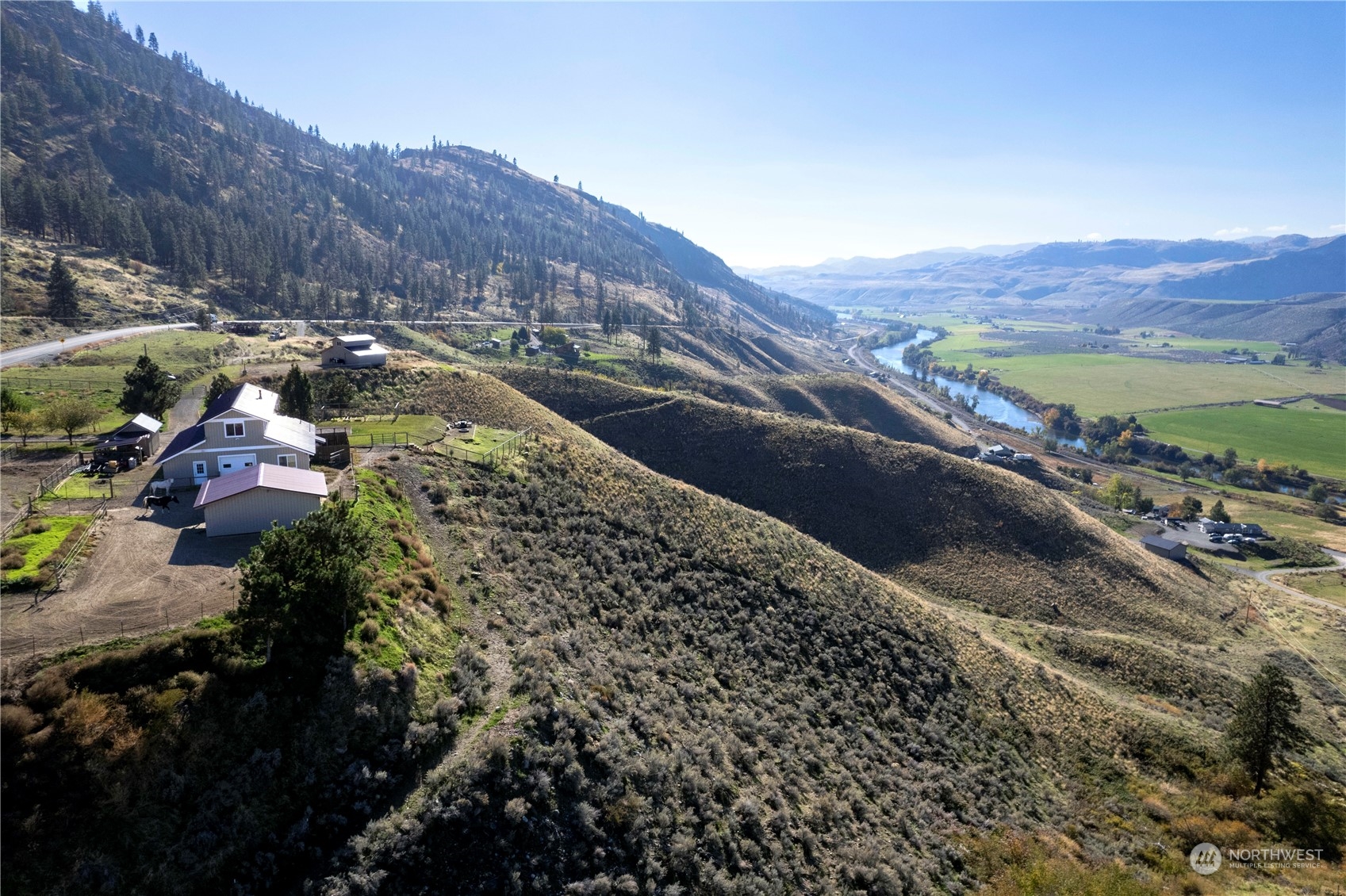 369 Tunk Creek Road Riverside, WA 98849 - Photo 13 of 40 a view of a city with mountains in the background