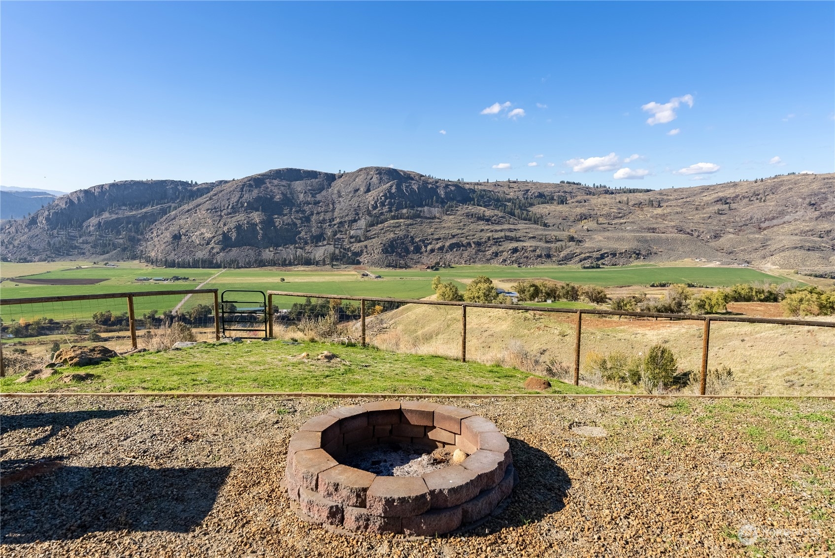 369 Tunk Creek Road Riverside, WA 98849 - Photo 17 of 40 a view of a lake with a mountain