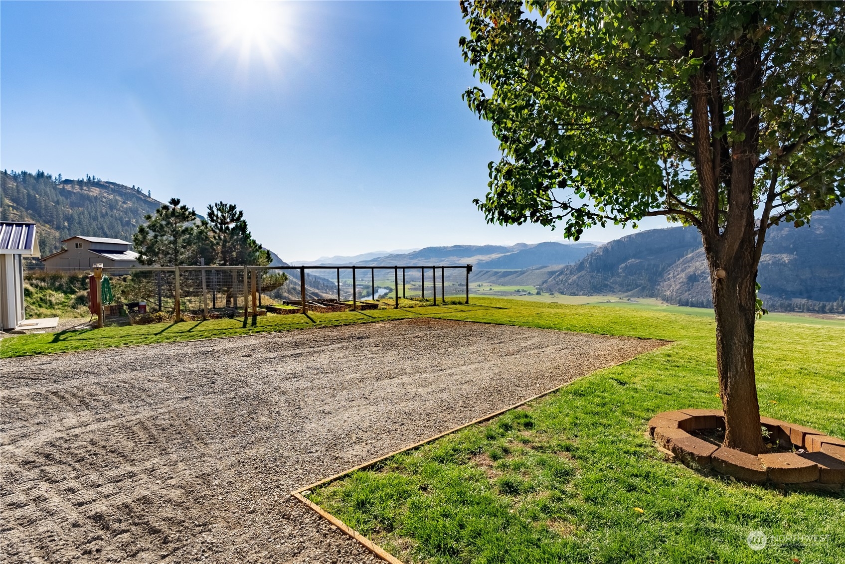 369 Tunk Creek Road Riverside, WA 98849 - Photo 19 of 40 a view of a swimming pool with a yard