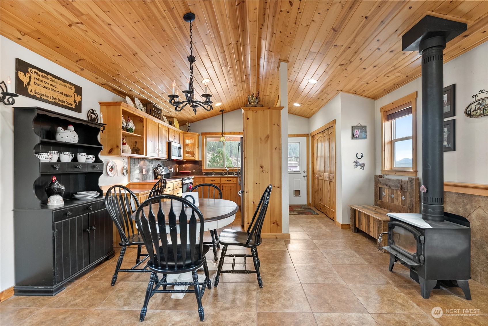 369 Tunk Creek Road Riverside, WA 98849 - Photo 22 of 40 a view of a dining room with furniture