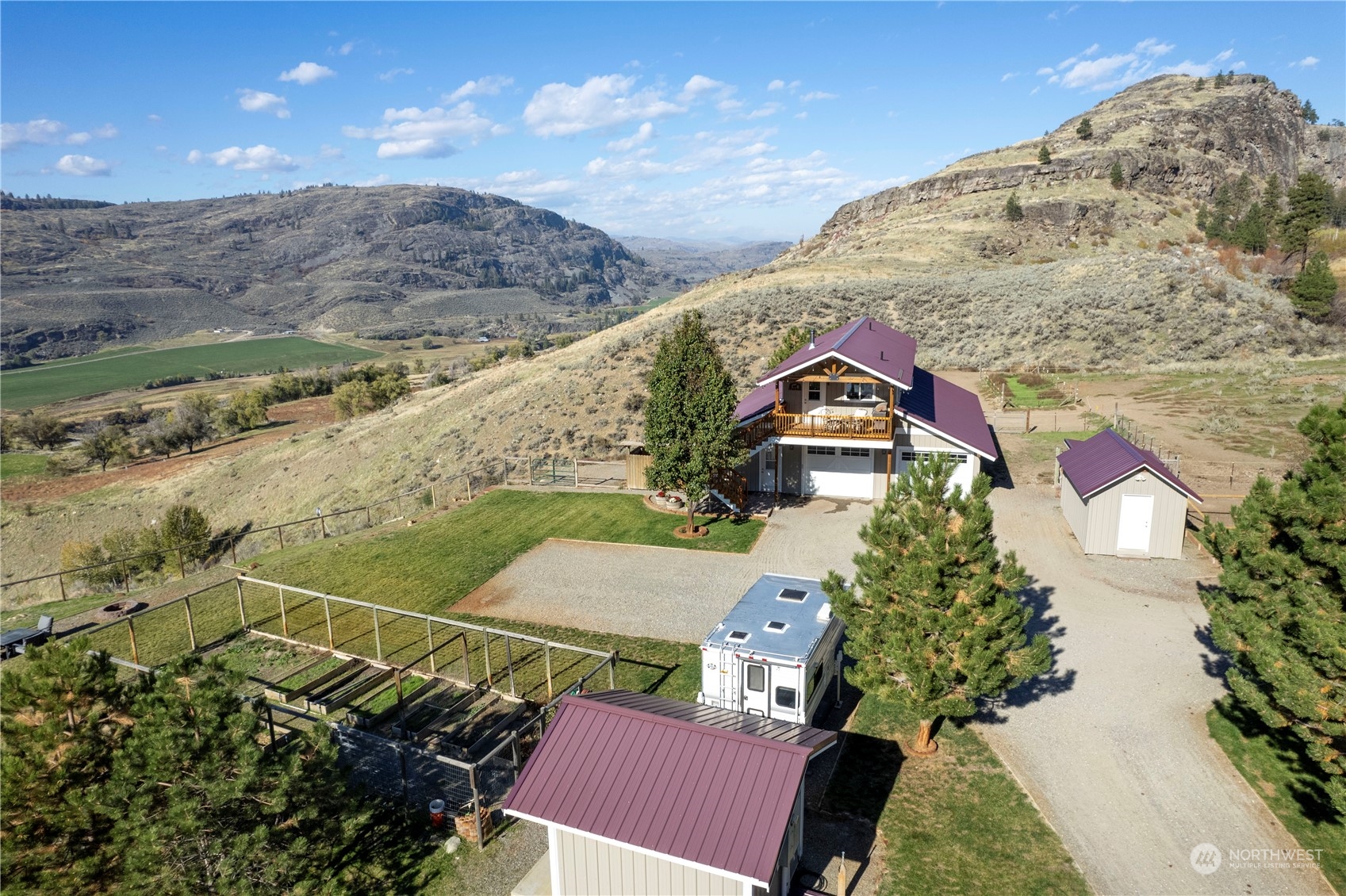 369 Tunk Creek Road Riverside, WA 98849 - Photo 3 of 40 a view of houses with outdoor space