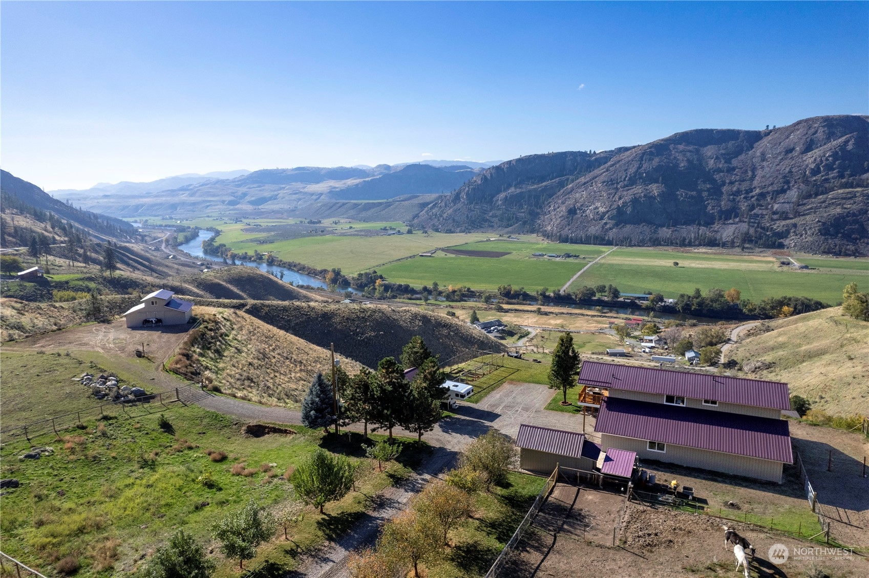 369 Tunk Creek Road Riverside, WA 98849 - Photo 5 of 40 a view of a backyard with sitting area