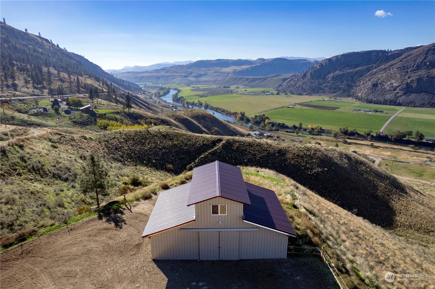369 Tunk Creek Road Riverside, WA 98849 - Photo 9 of 40 a view of a city from a balcony