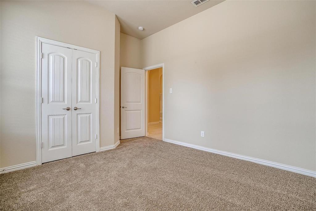 205 Mineral Point Drive Aledo, TX 76008 - Photo 22 of 38 an empty room with windows