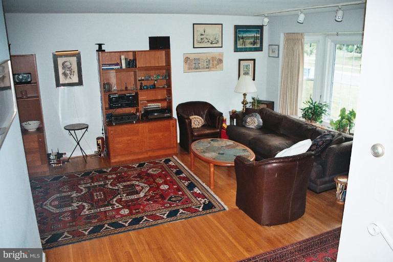 612 Kenbrook Drive Silver Spring, MD 20902 - Photo 5 of 11 a living room with furniture and wooden floor