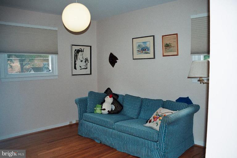 612 Kenbrook Drive Silver Spring, MD 20902 - Photo 9 of 11 a living room with furniture and a window
