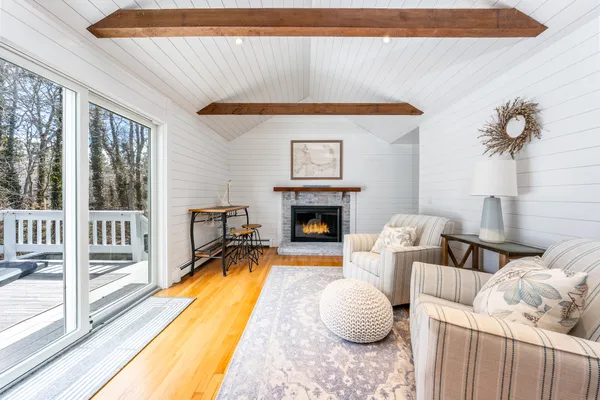 a bedroom with bed and window