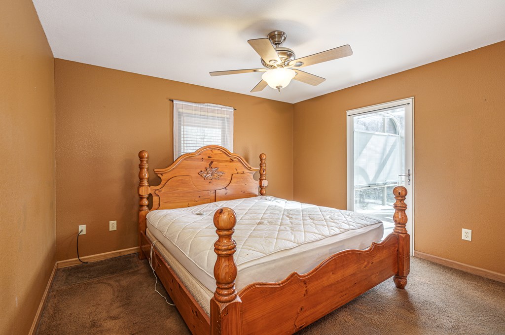 41 Carvers Vw Trail Murphy, NC 28906 - Photo 13 of 46 a bed sitting in a bedroom next to a window