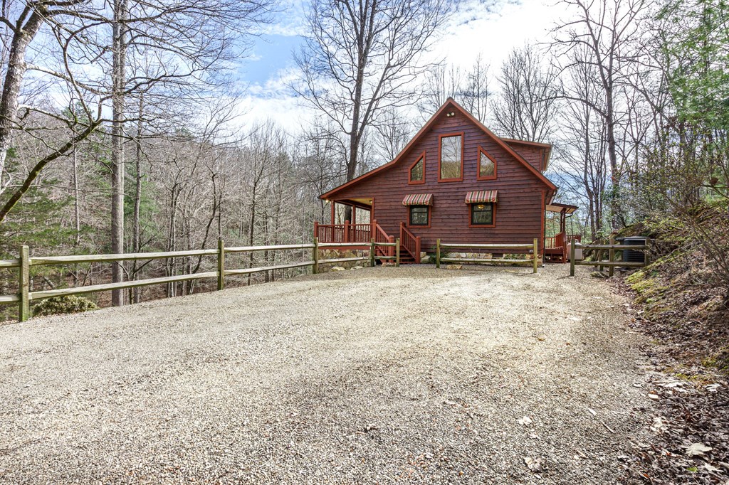 41 Carvers Vw Trail Murphy, NC 28906 - Photo 2 of 46 a view of a house with a yard and wooden fence