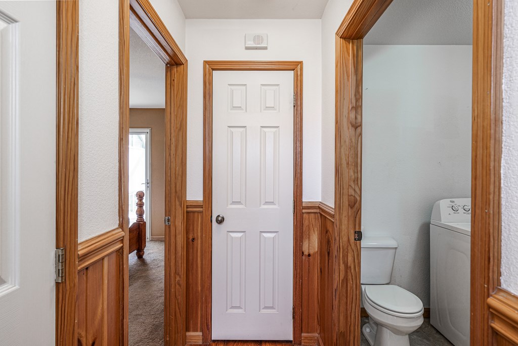 41 Carvers Vw Trail Murphy, NC 28906 - Photo 26 of 46 a bathroom with a granite countertop toilet a sink and a mirror