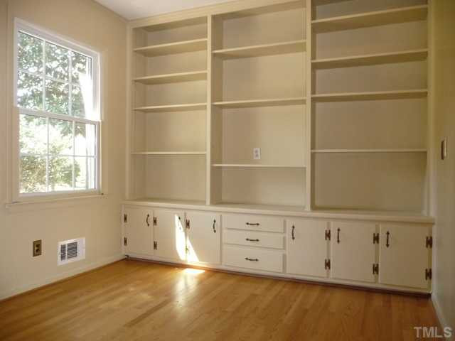 122 Lord Ashley Road Raleigh, NC 27610 - Photo 4 of 25 The Library, with its own closet, is conveniently adjacent to the welcoming foyer.