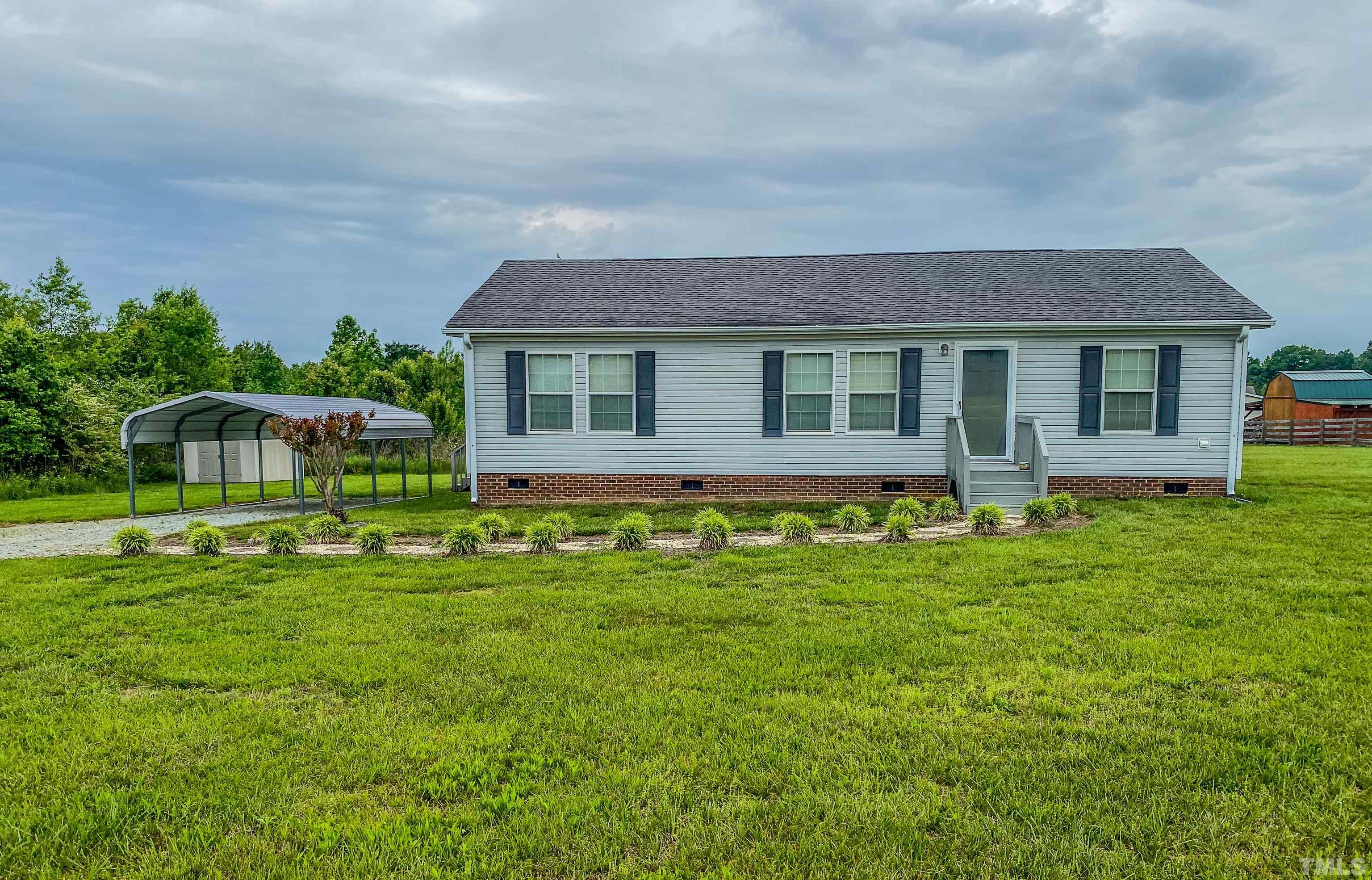 a front view of house with yard