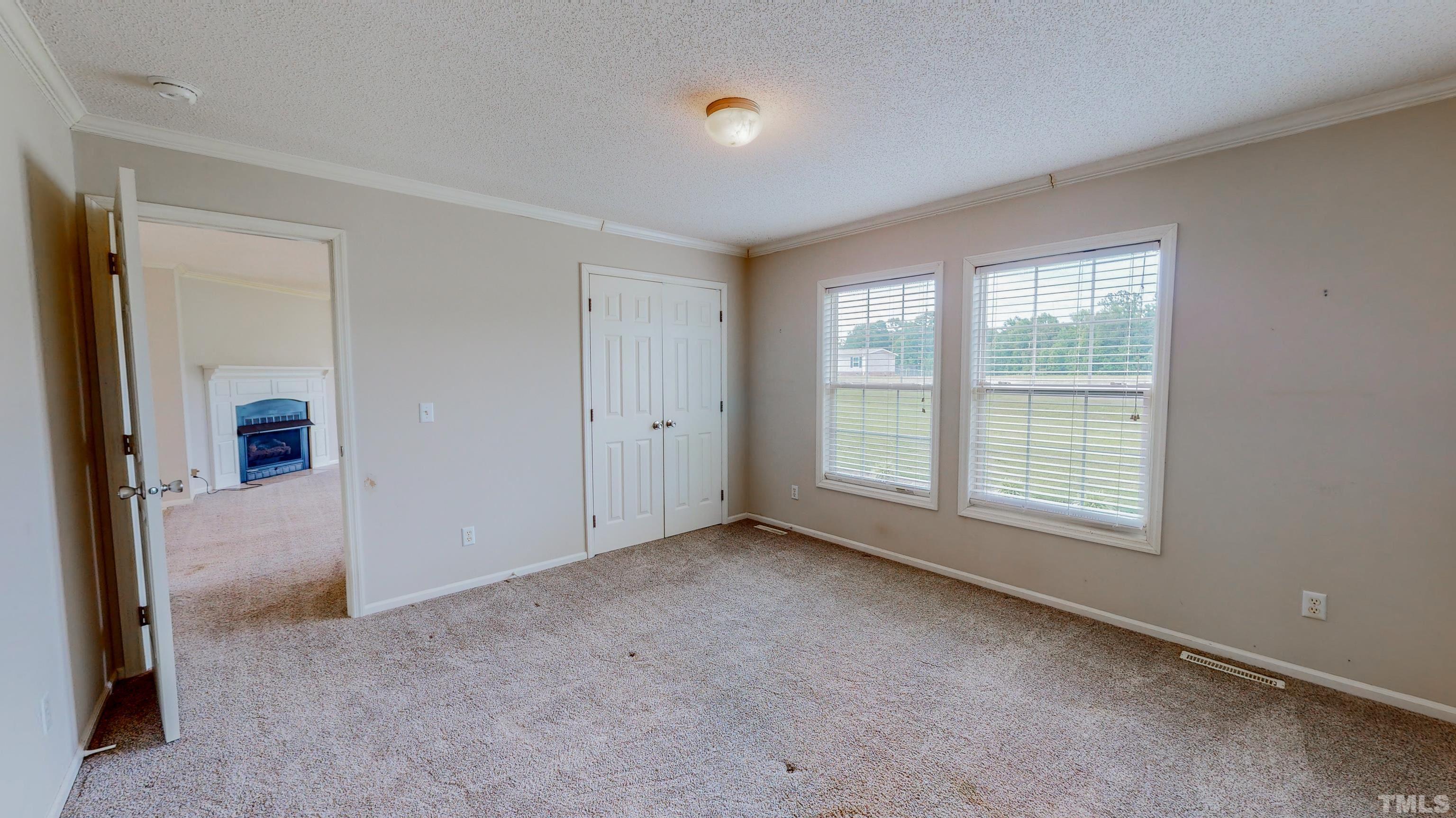 147 Quartergate Road Roxboro, NC 27574 - Photo 12 of 30 a view of an empty room with a window