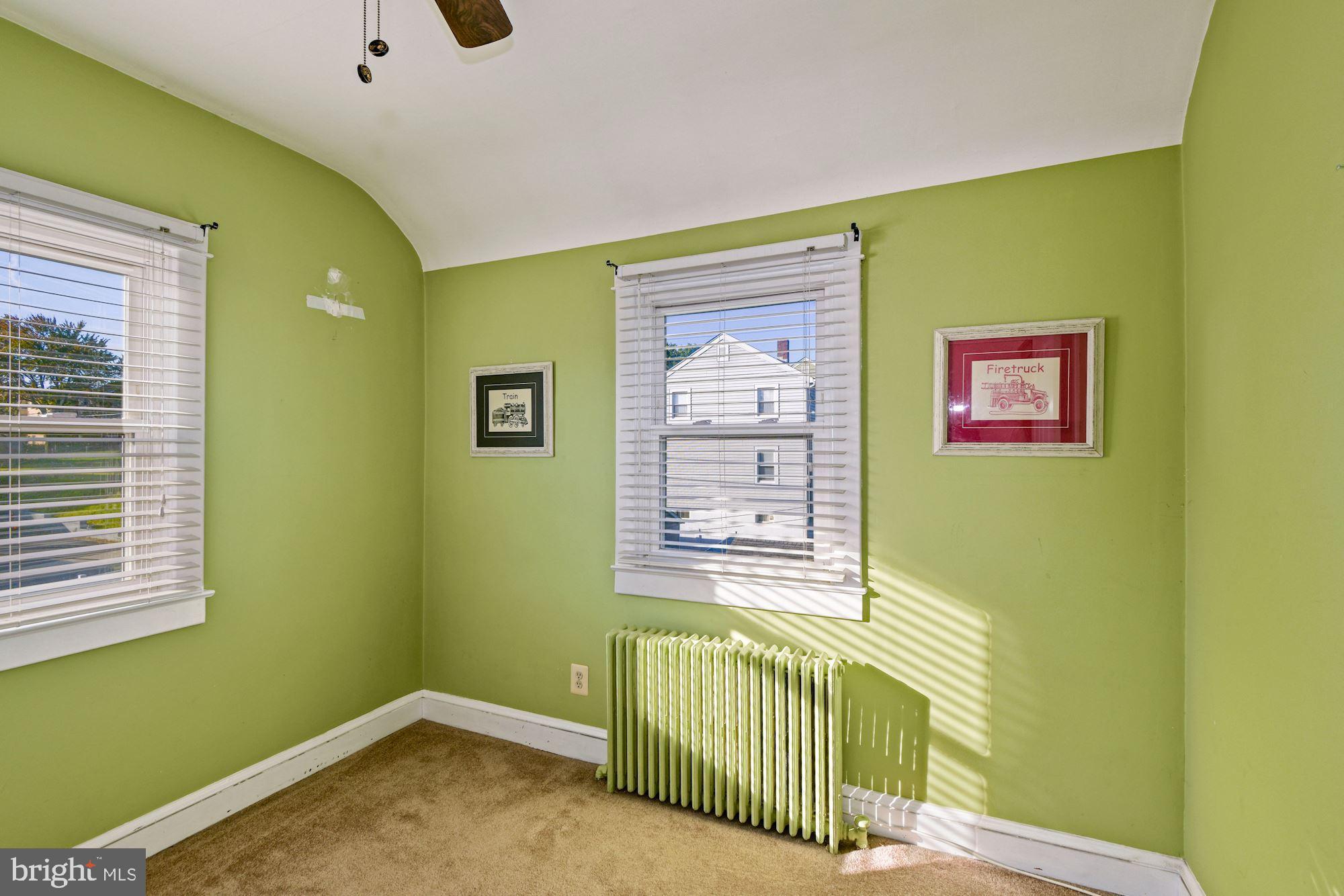 5524 Ashbourne Road Baltimore, MD 21227 - Photo 18 of 23 a view of a livingroom with windows