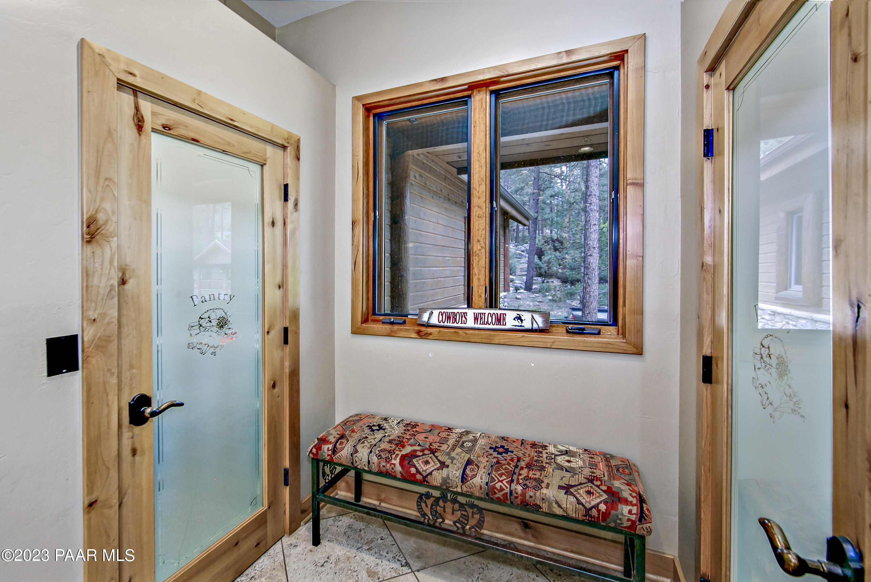 5140 East Charcoal Kiln Road Prescott, AZ 86303 - Photo 20 of 77 a bed room with a bed and a painting on the wall