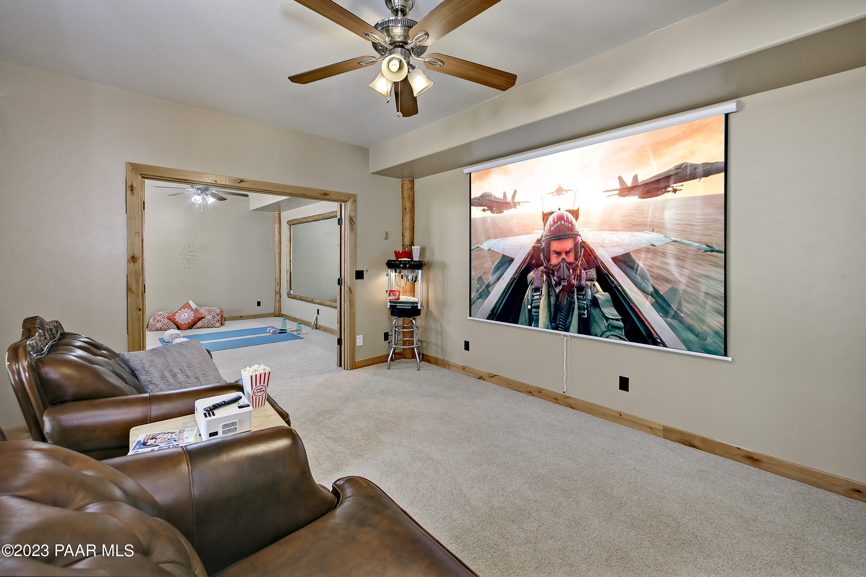 5140 East Charcoal Kiln Road Prescott, AZ 86303 - Photo 34 of 77 a living room with furniture and a flat screen tv