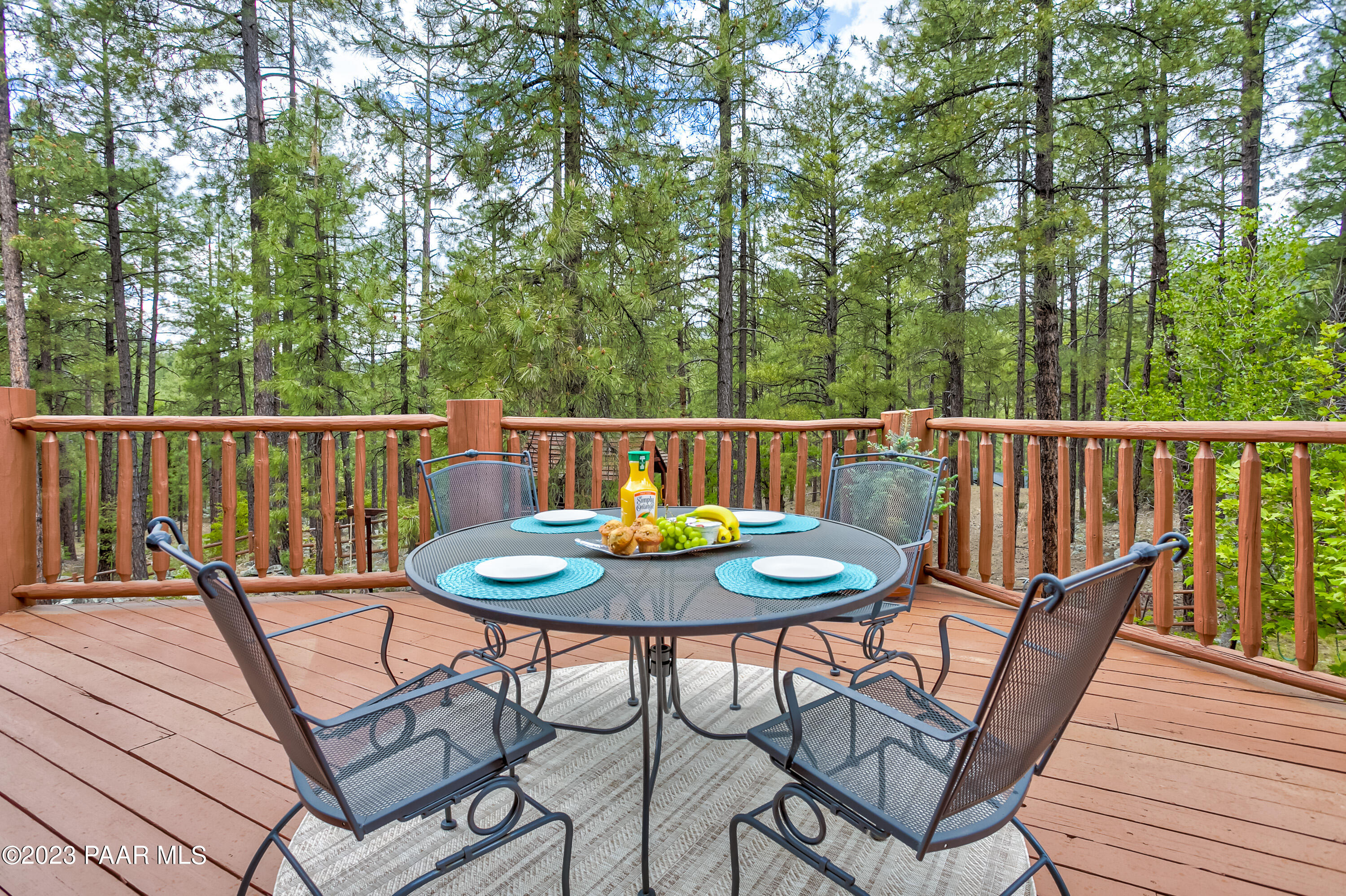 5140 East Charcoal Kiln Road Prescott, AZ 86303 - Photo 49 of 77 a view of a chairs and table in the patio