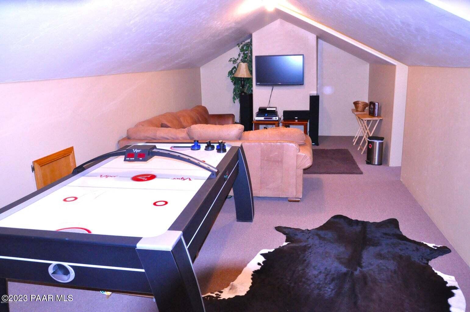 5140 East Charcoal Kiln Road Prescott, AZ 86303 - Photo 72 of 77 a bed room with a bed and a lamp