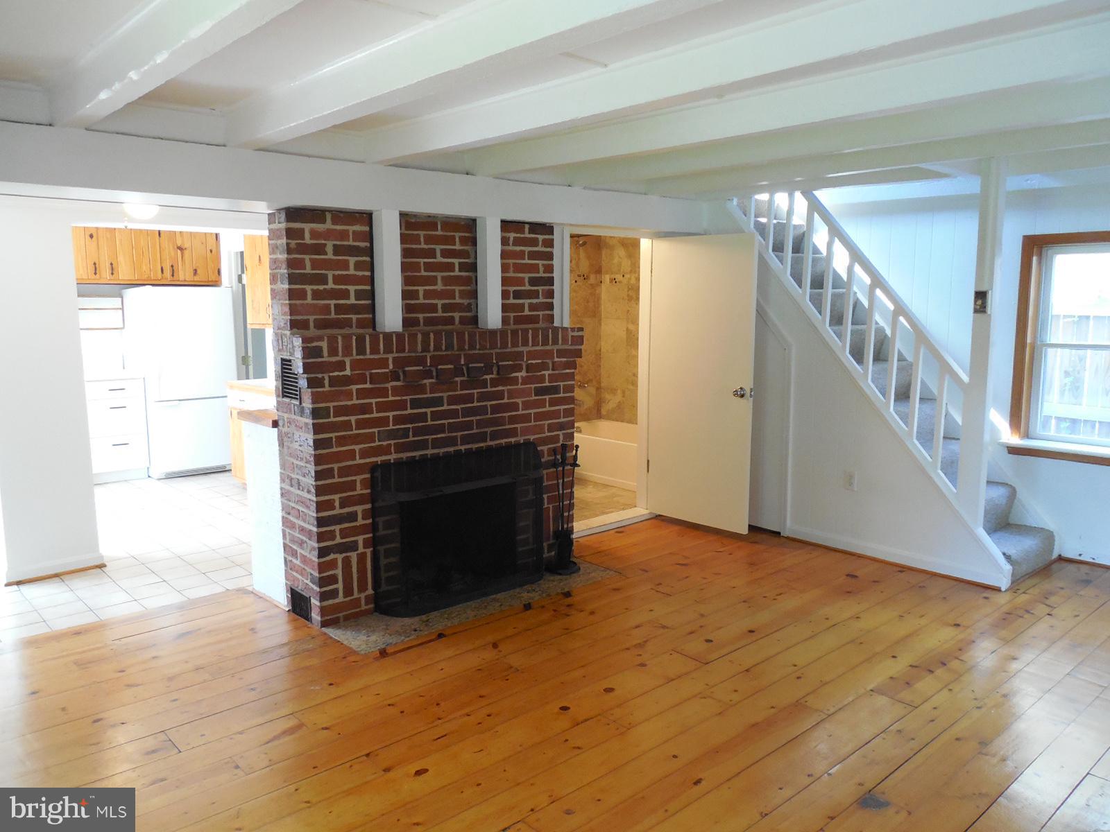 705 Londontown Road Edgewater, MD 21037 - Photo 4 of 22 Living Room / fireplace / wood floors 15 x 18