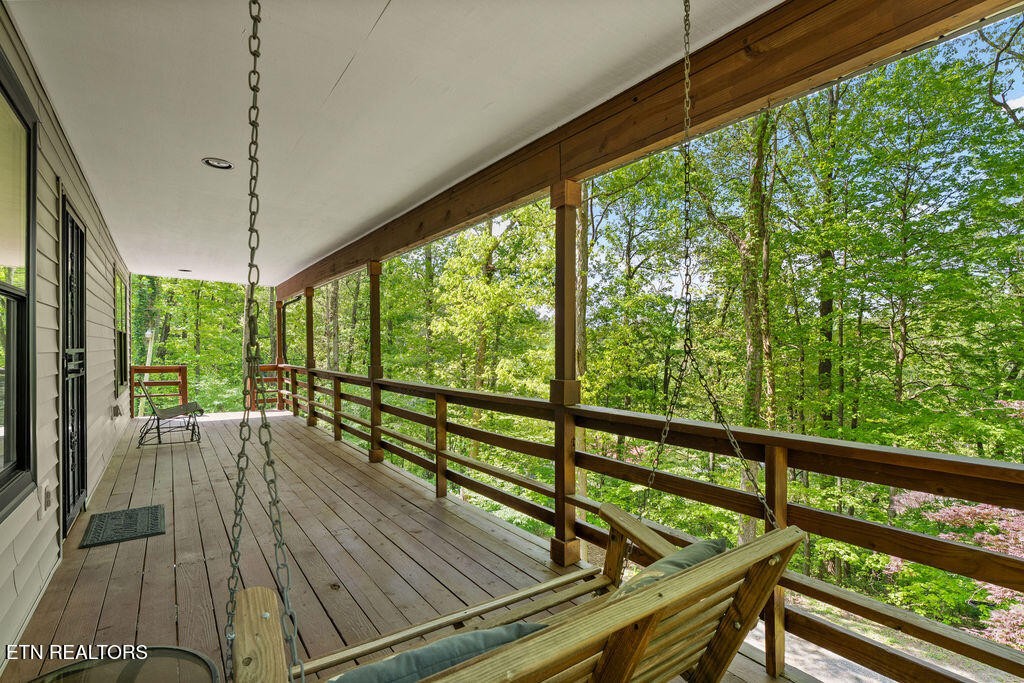 8908 Ellis Lane Powell, TN 37849 - Photo 34 of 37 a view of balcony with wooden floor