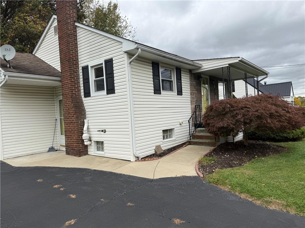 1422 Johnson Street New Castle, PA 16101 - Photo 2 of 15 a view of a house with a yard