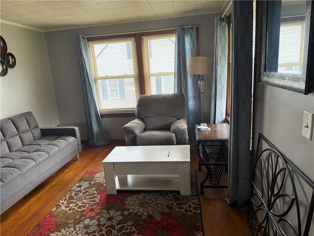 1422 Johnson Street New Castle, PA 16101 - Photo 5 of 15 a living room with furniture and a window