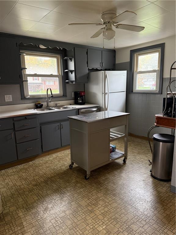 1422 Johnson Street New Castle, PA 16101 - Photo 7 of 15 a kitchen with sink cabinets and window