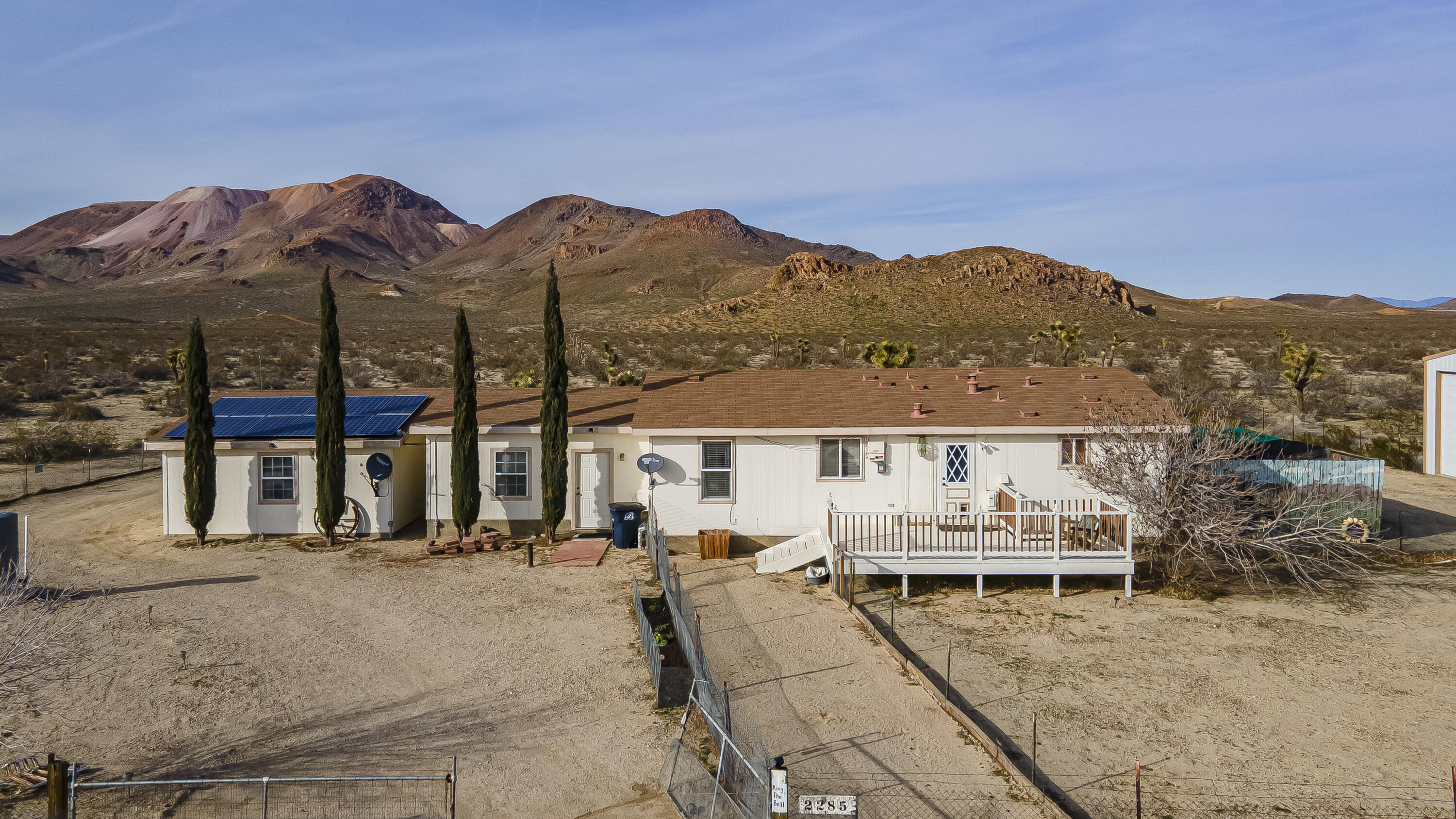 2285 Backus Road Mojave, CA 93501 - Photo 18 of 35 a view of a house with a yard