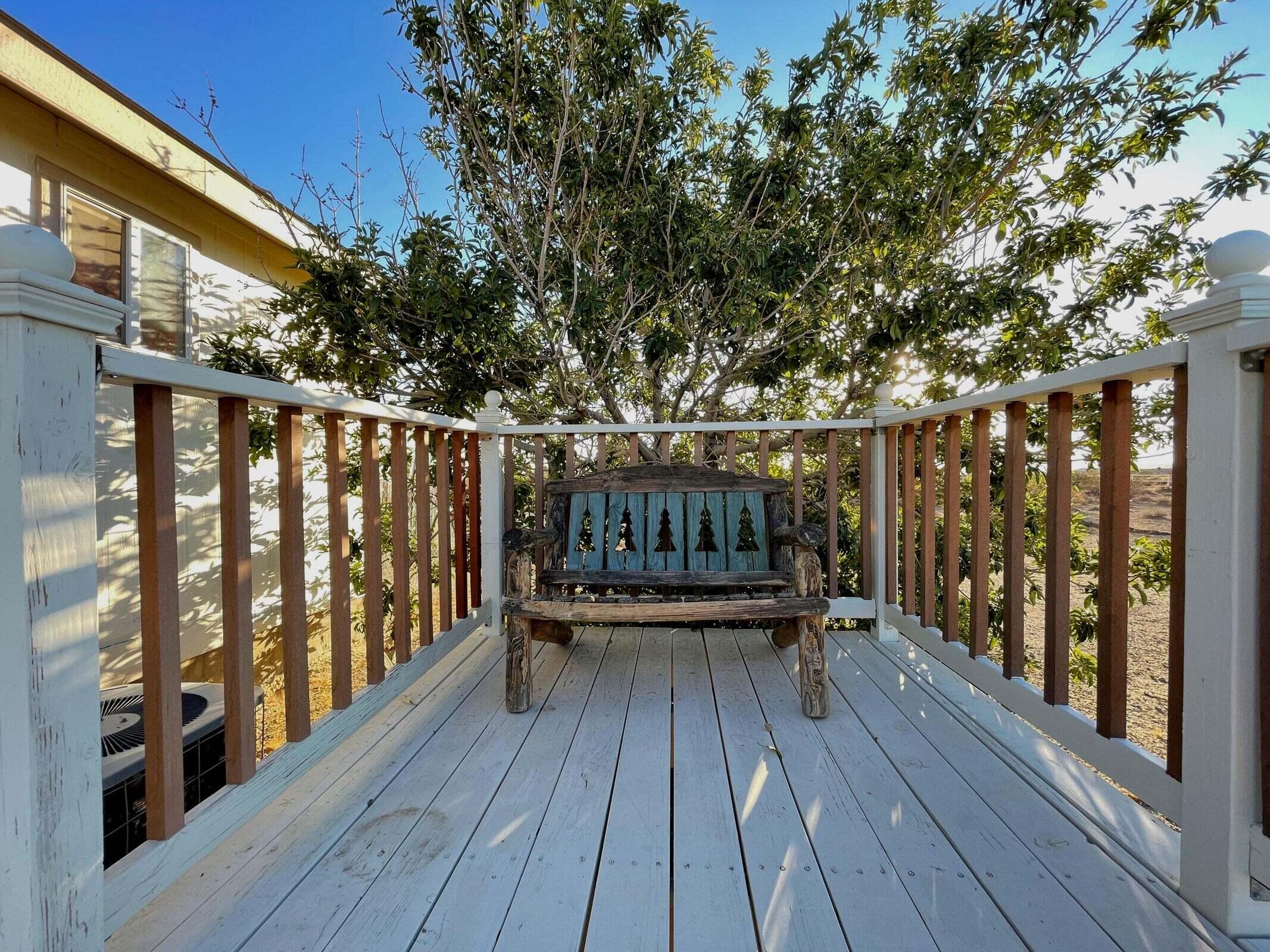 2285 Backus Road Mojave, CA 93501 - Photo 20 of 35 a view of balcony with wooden floor and fence